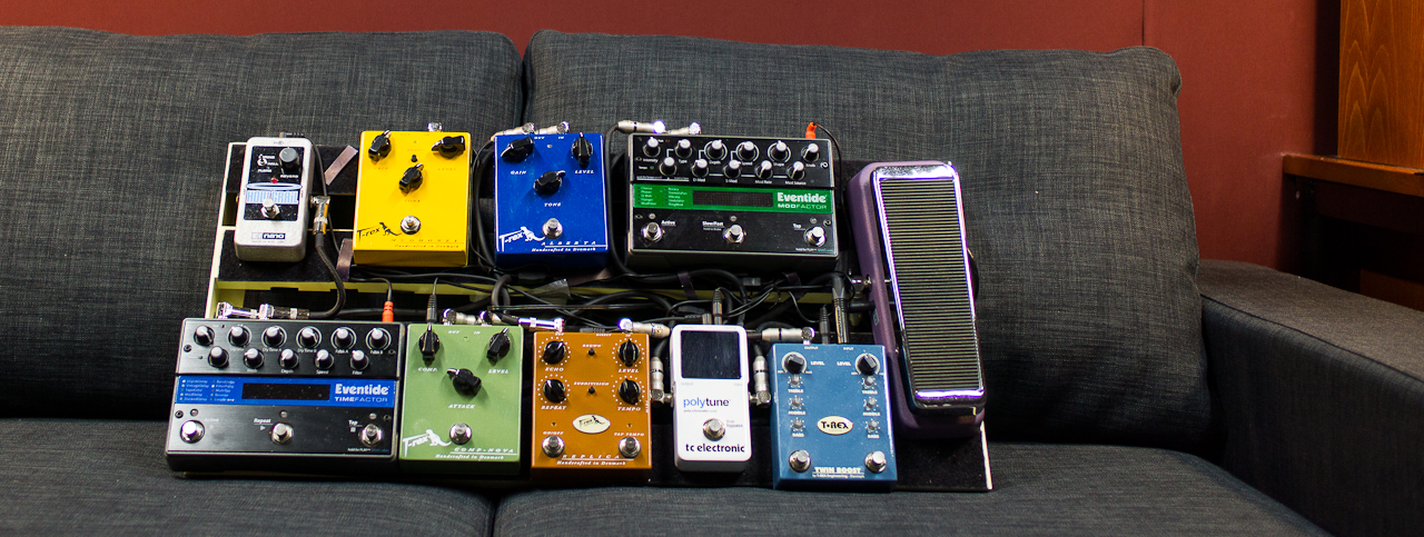 My main pedalboard featuring: HolyGrail Nano, T-Rex Mudhoney, T-Rex Alberta, Eventide ModFactor, Eventide TimeFactor, T-Rex Comp-Nova, T-Rex Replica, TC Polytune, T-Rex TwinBoost and Budda Wah(pre-Peavey). Juice comes from the T-Rex Fuel Tank.